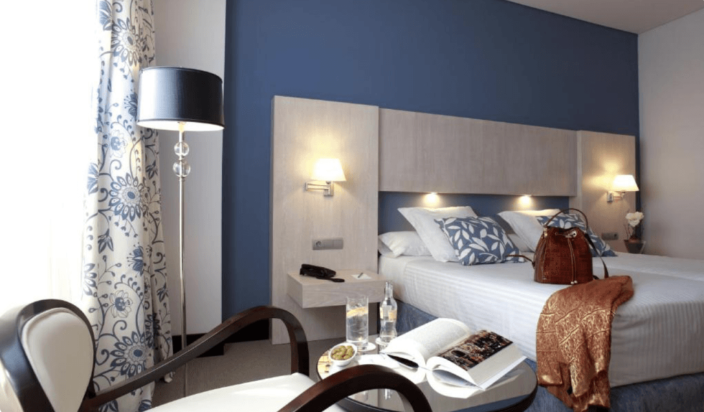 hotel 4 estrellas cerca aeropuerto Madrid Barajas con traslado gratis